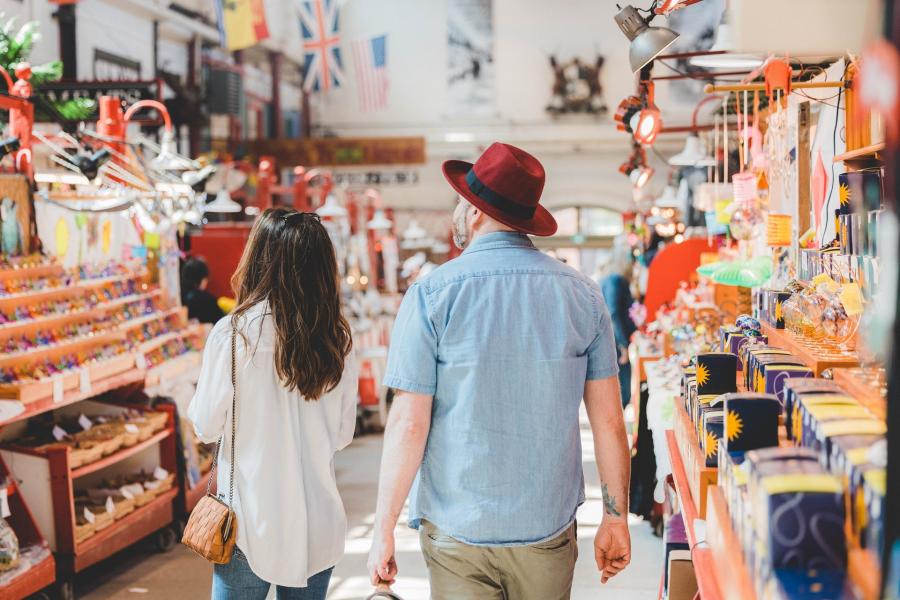 Couple walking in an aisle of the Saint John City Market
