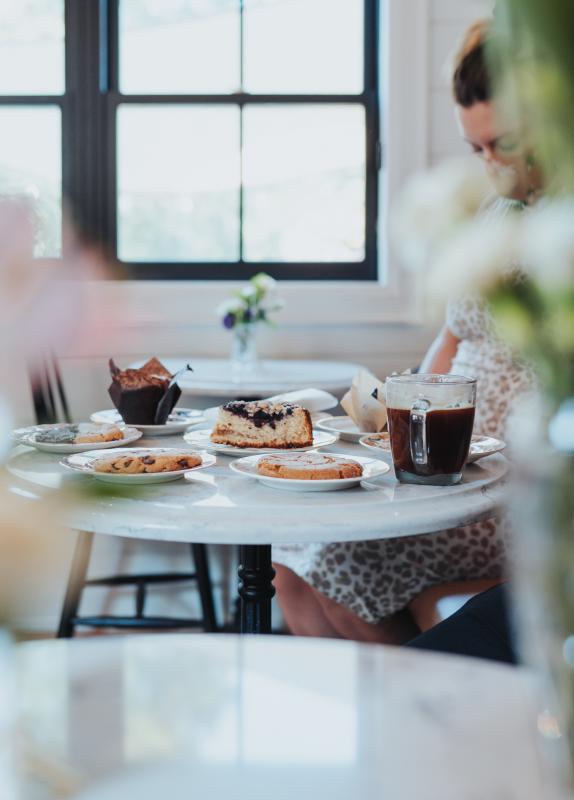 a cafe filled with treats and tea