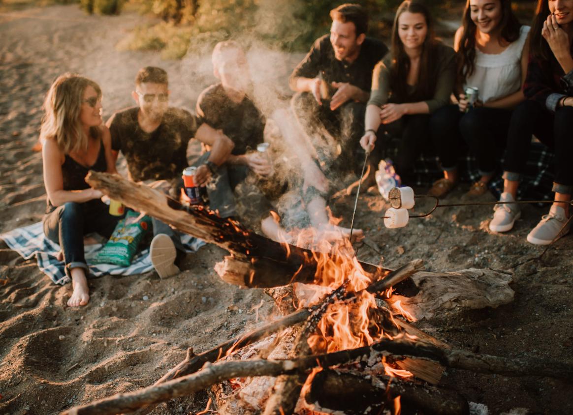 people around a campfire